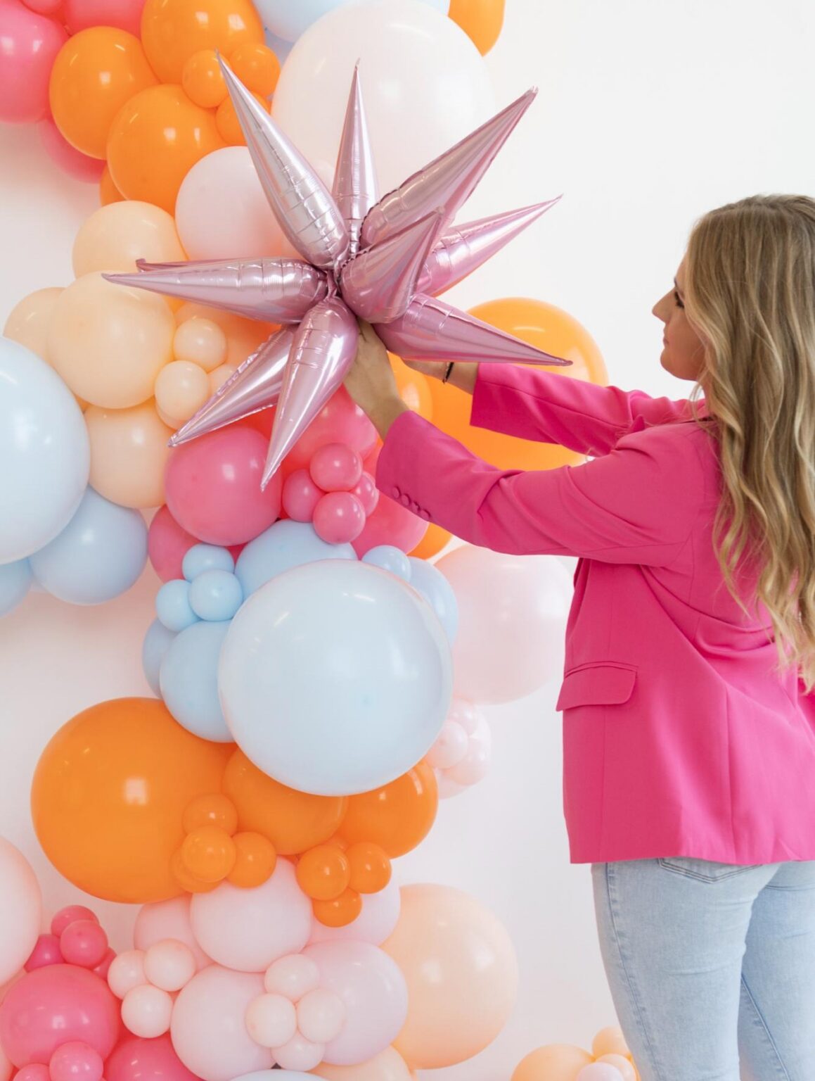 balloon brand shoot woman pink starburst mauis balloons