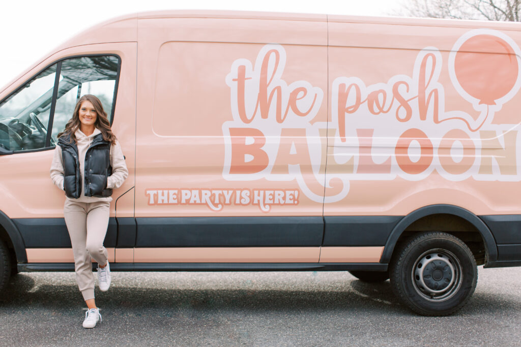 The Posh Balloon branded pink delivery van in Charlotte, NC
