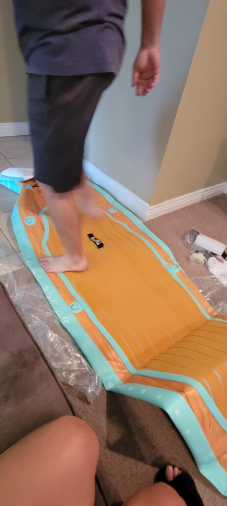 inflating DAMA inflatable paddleboard